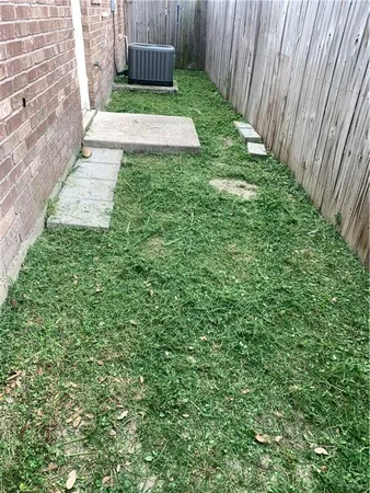 a view of yard with pathway