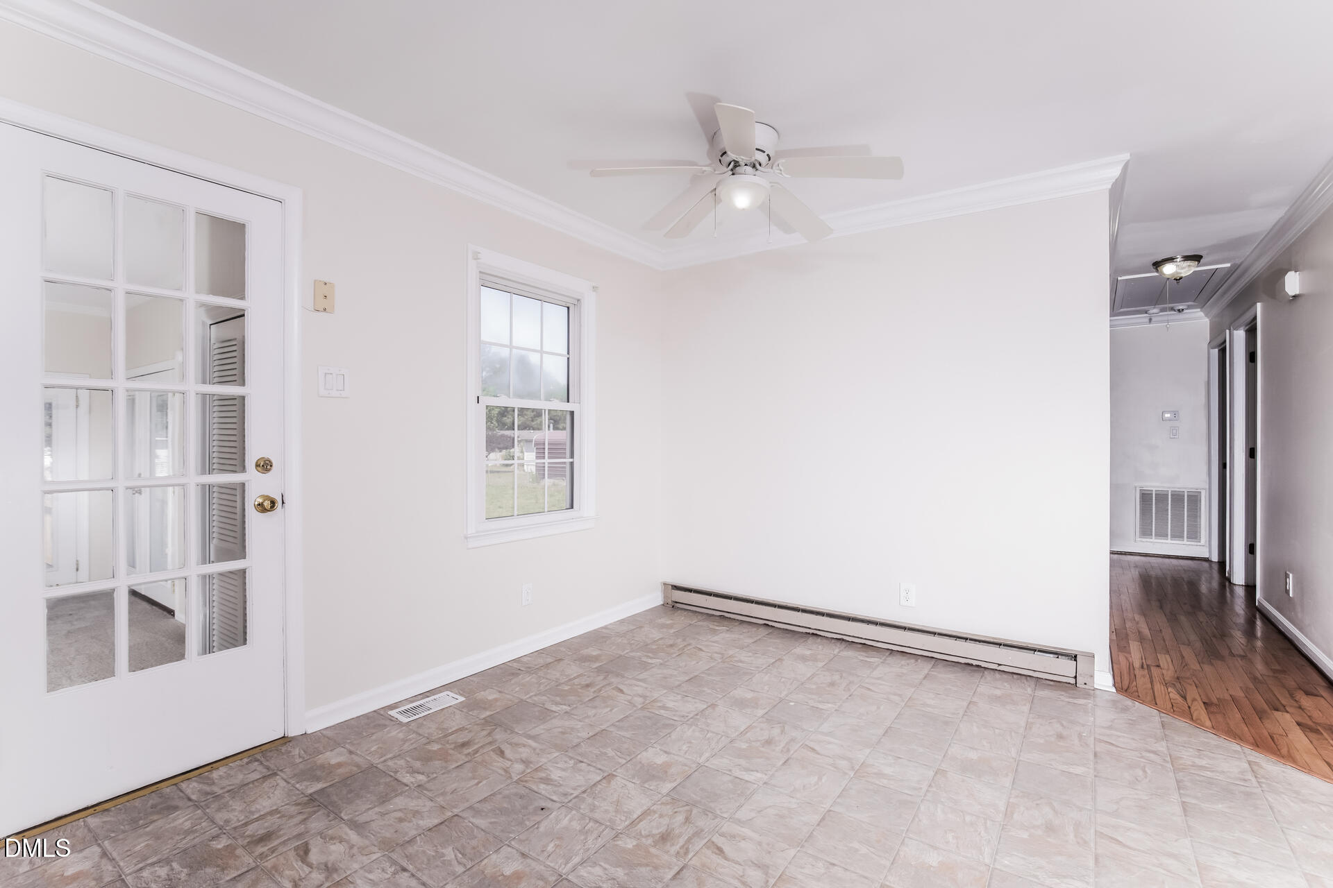 870 Abbott Road Henderson, NC 27537 - Photo 9 of 20 an empty room with windows