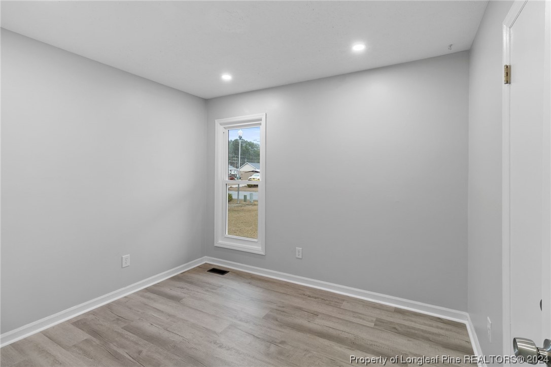 4108 Mill Bridge Road Hope Mills, NC 28348 - Photo 12 of 27 an empty room with a window