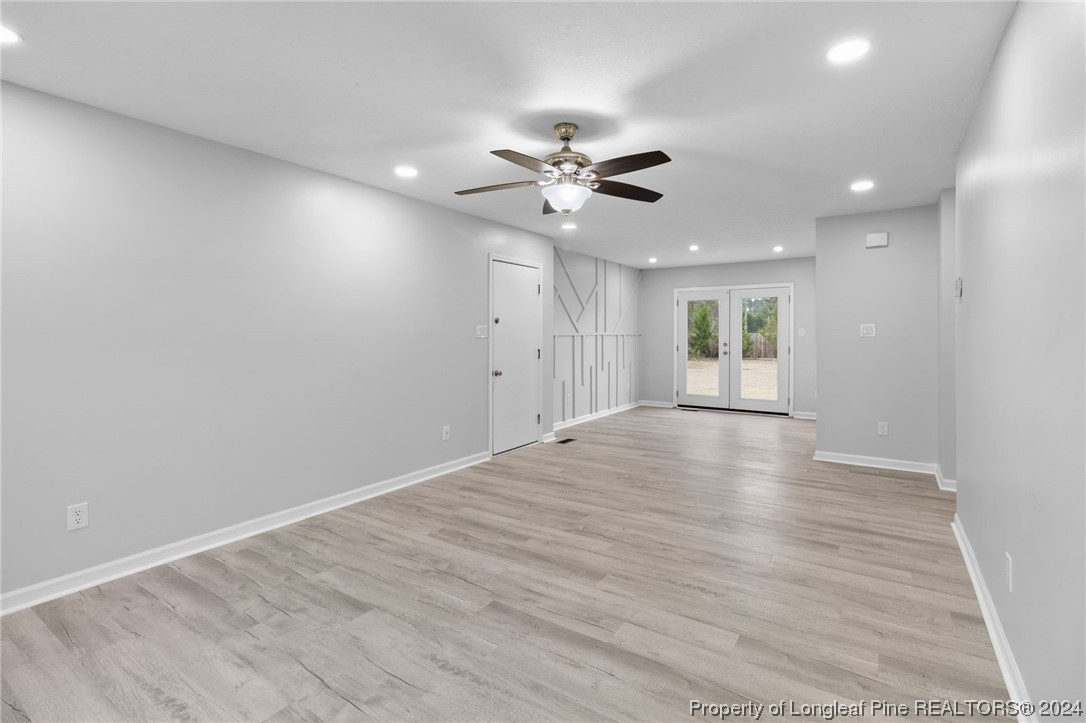 4108 Mill Bridge Road Hope Mills, NC 28348 - Photo 5 of 27 a view of an empty room with a window