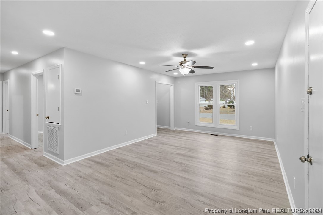 4108 Mill Bridge Road Hope Mills, NC 28348 - Photo 6 of 27 a view of a livingroom with wooden floor