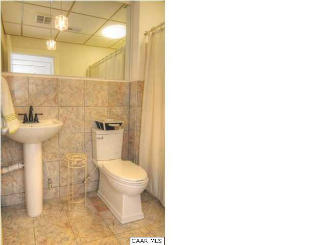 716 Wolf Trap Road Charlottesville, VA 22911 - Photo 21 of 26 a bathroom with a toilet and a sink