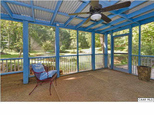 716 Wolf Trap Road Charlottesville, VA 22911 - Photo 22 of 26 a living room with a large window
