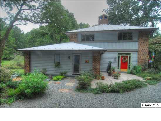 716 Wolf Trap Road Charlottesville, VA 22911 - Photo 3 of 26 a front view of a house with garden