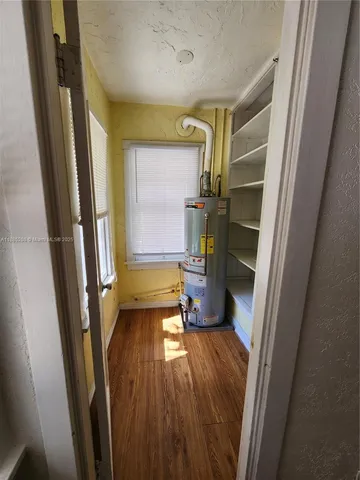 a view of entry way with wooden door