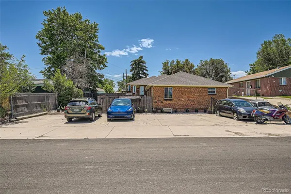 a car parked in front of a house