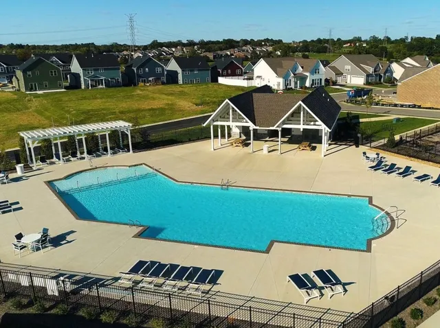 an aerial view of a house with a garden
