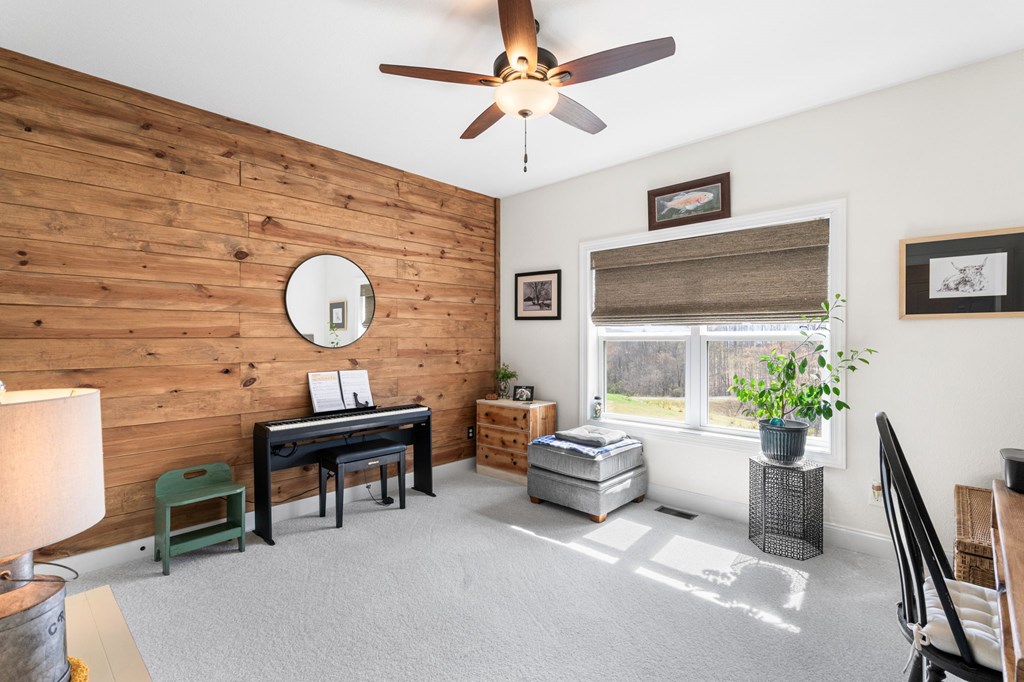 958 New Forest Road Young Harris, GA 30582 - Photo 26 of 44 a living room with furniture and a large window