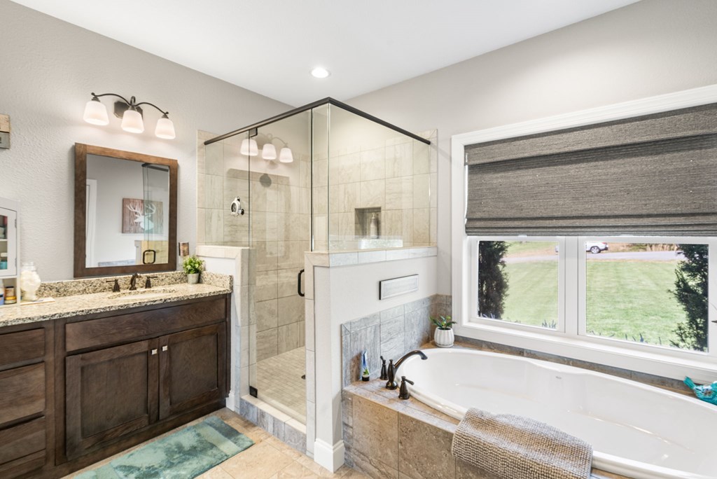958 New Forest Road Young Harris, GA 30582 - Photo 34 of 44 a bathroom with a tub sink shower and mirror