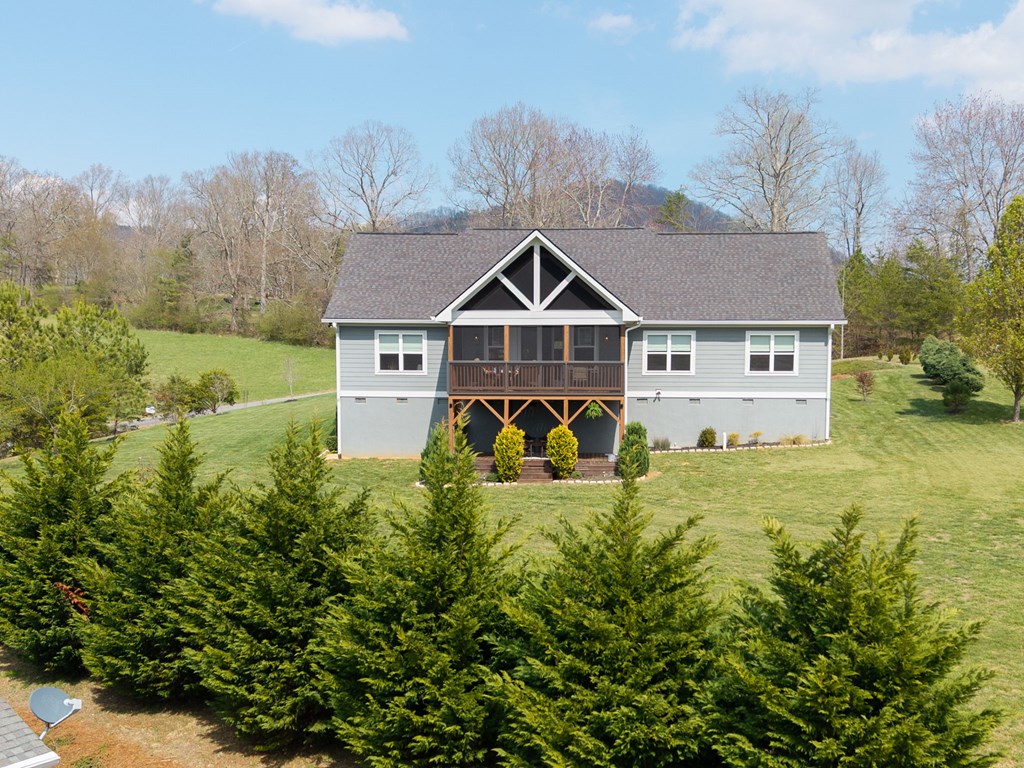 958 New Forest Road Young Harris, GA 30582 - Photo 41 of 44 a view of a house with a big yard plants and large trees