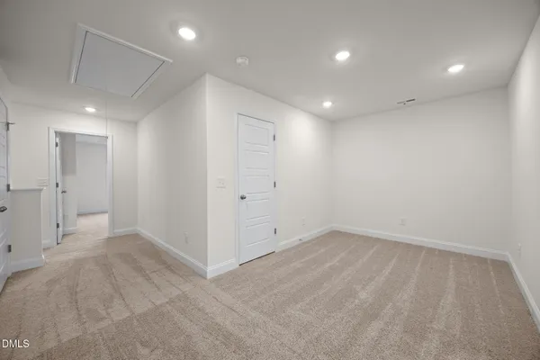 an empty room with an entryway