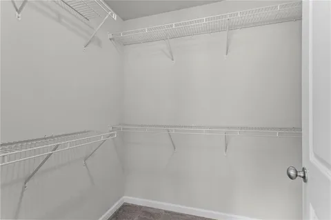 a view of a room with racks on the wall