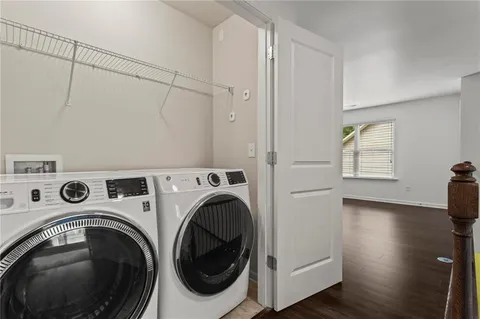 a view of a storage & utility room with washer and dryer