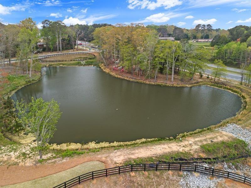 1707 Harper Lily Lane Lawrenceville, GA 30043 - Photo 13 of 43 a view of a lake from a balcony