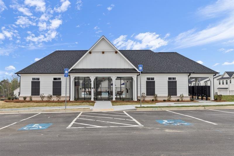 1707 Harper Lily Lane Lawrenceville, GA 30043 - Photo 2 of 43 a front view of a building with street view