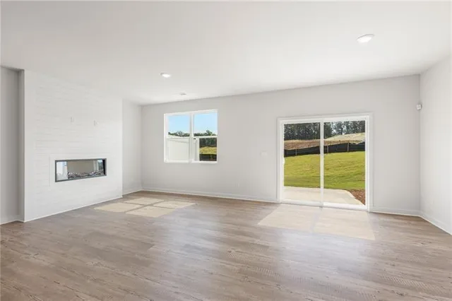 a view of a hallway with wooden shelves
