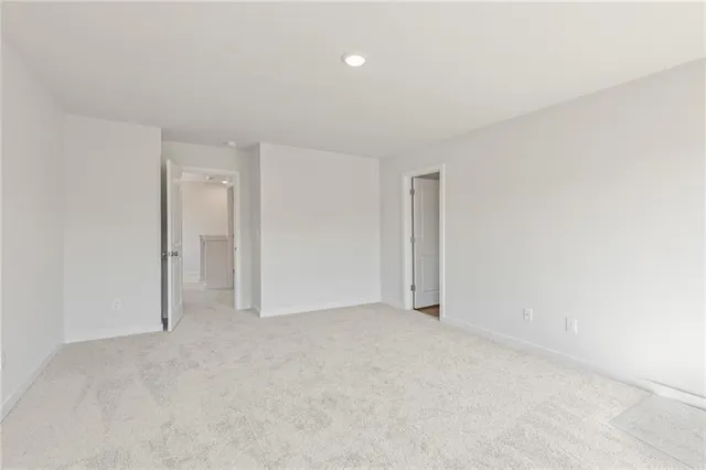 a bathroom with a double vanity sink and mirror
