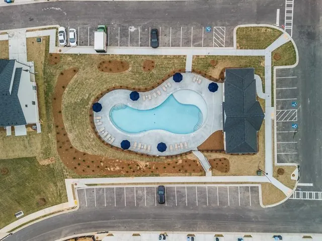 an aerial view of a swimming pool