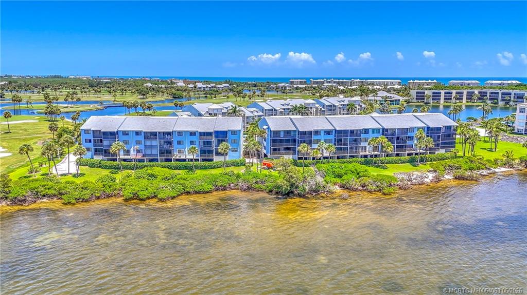 10 Northeast Plantation Road, Unit 101 Jensen Beach, FL 34957 - Photo 3 of 53 a view of a city with a lake view