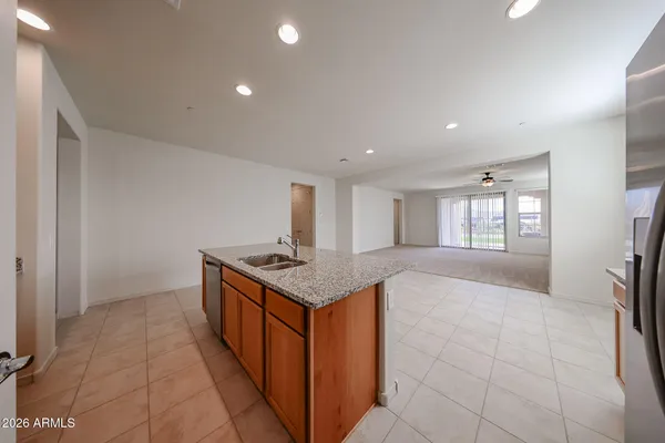 a kitchen with a stove and a sink