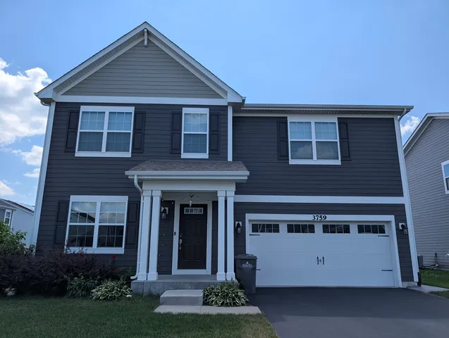 a view of a house with garden