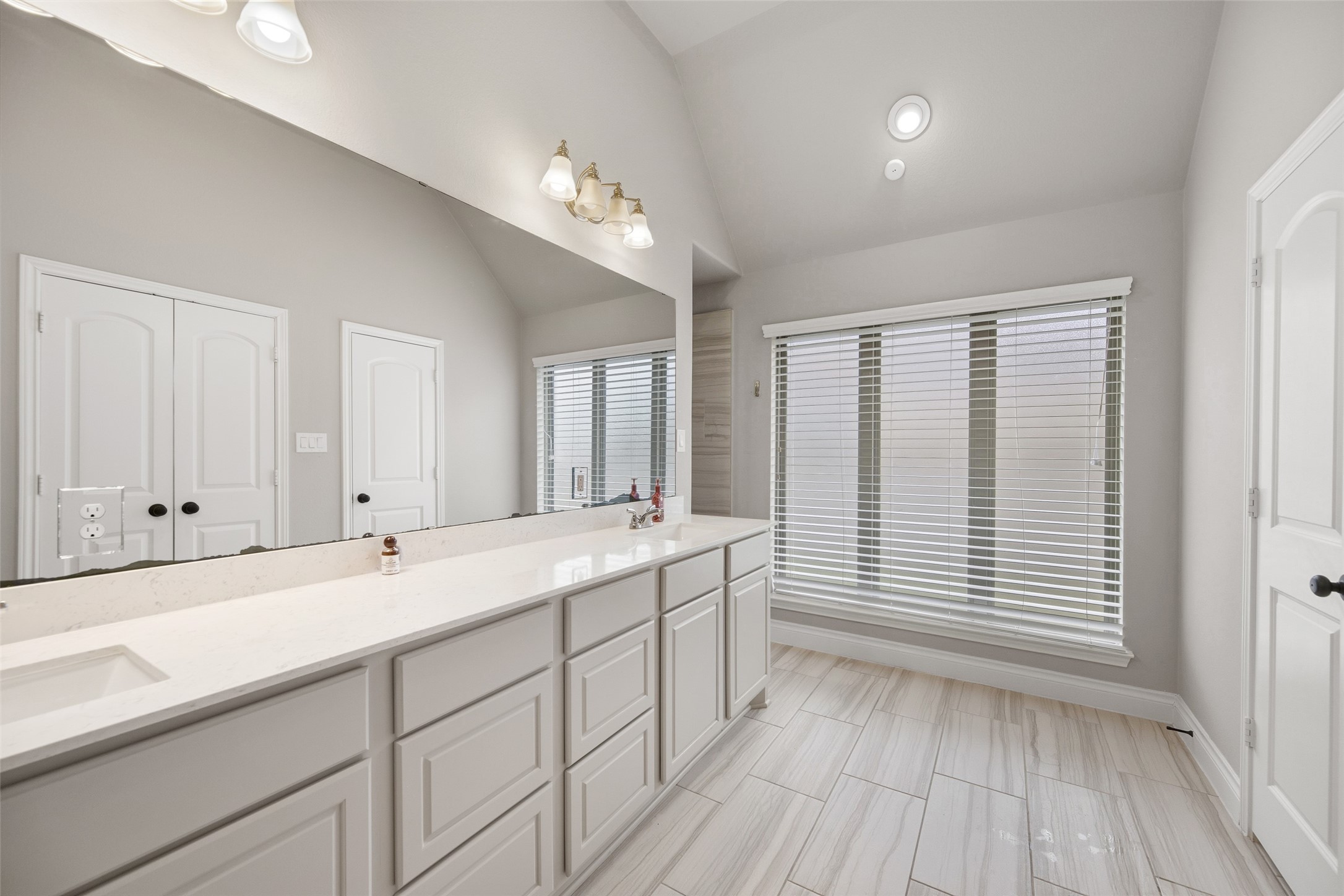 1934 Bayleaf Manor Drive Manvel, TX 77578 - Photo 28 of 37 a bathroom with a sink and a mirror