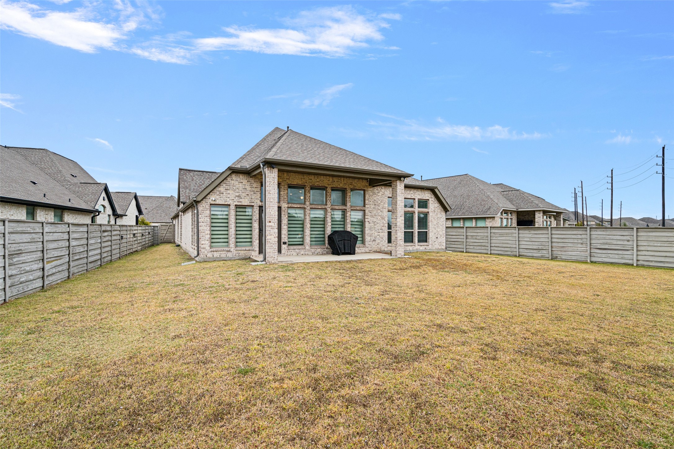 1934 Bayleaf Manor Drive Manvel, TX 77578 - Photo 30 of 37 a view of a house with a backyard