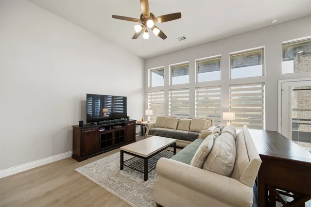 a living room with furniture and a window