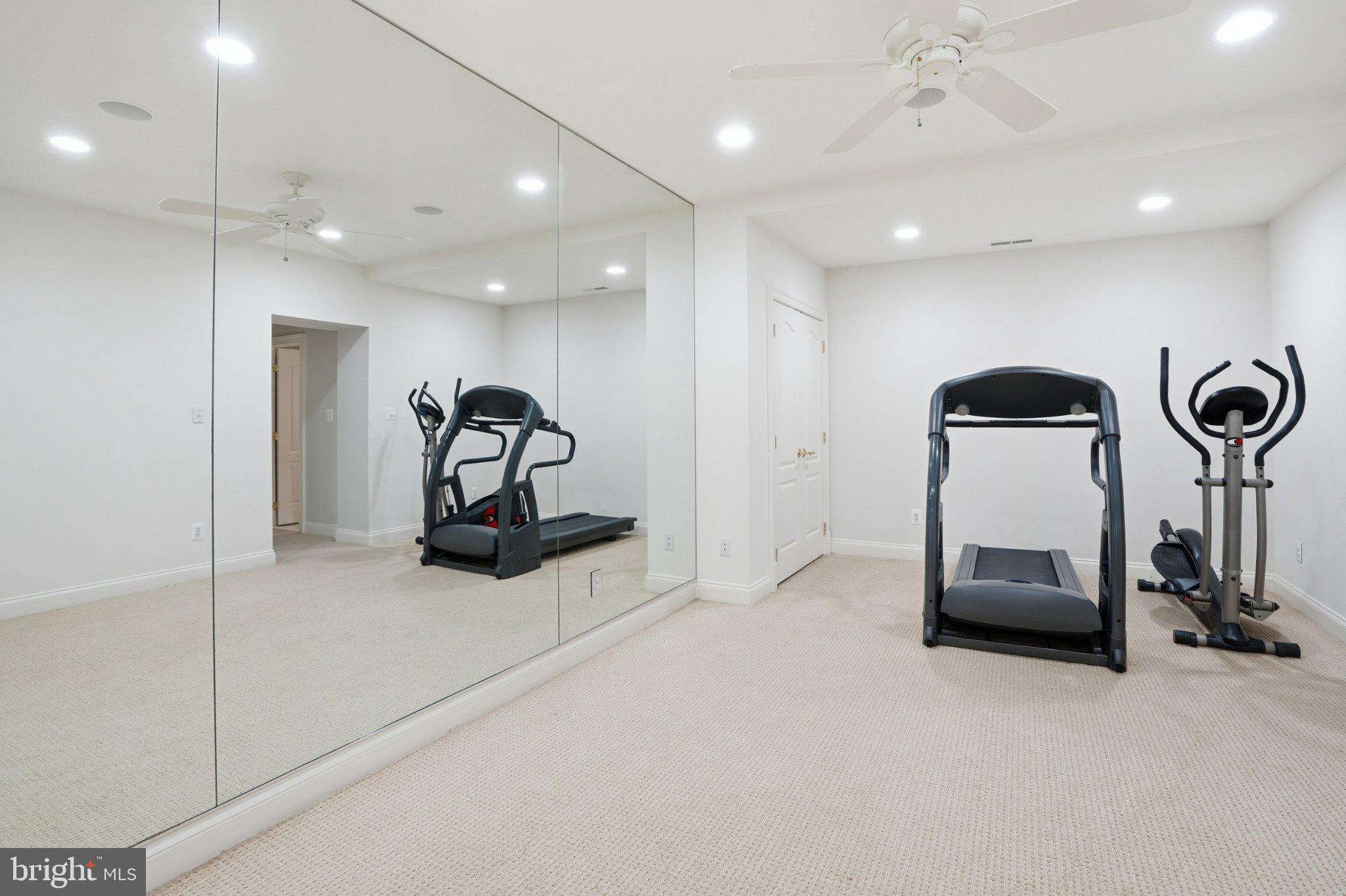 891 Chinquapin Road McLean, VA 22102 - Photo 70 of 78 Spacious home gym with mirrored walls.
