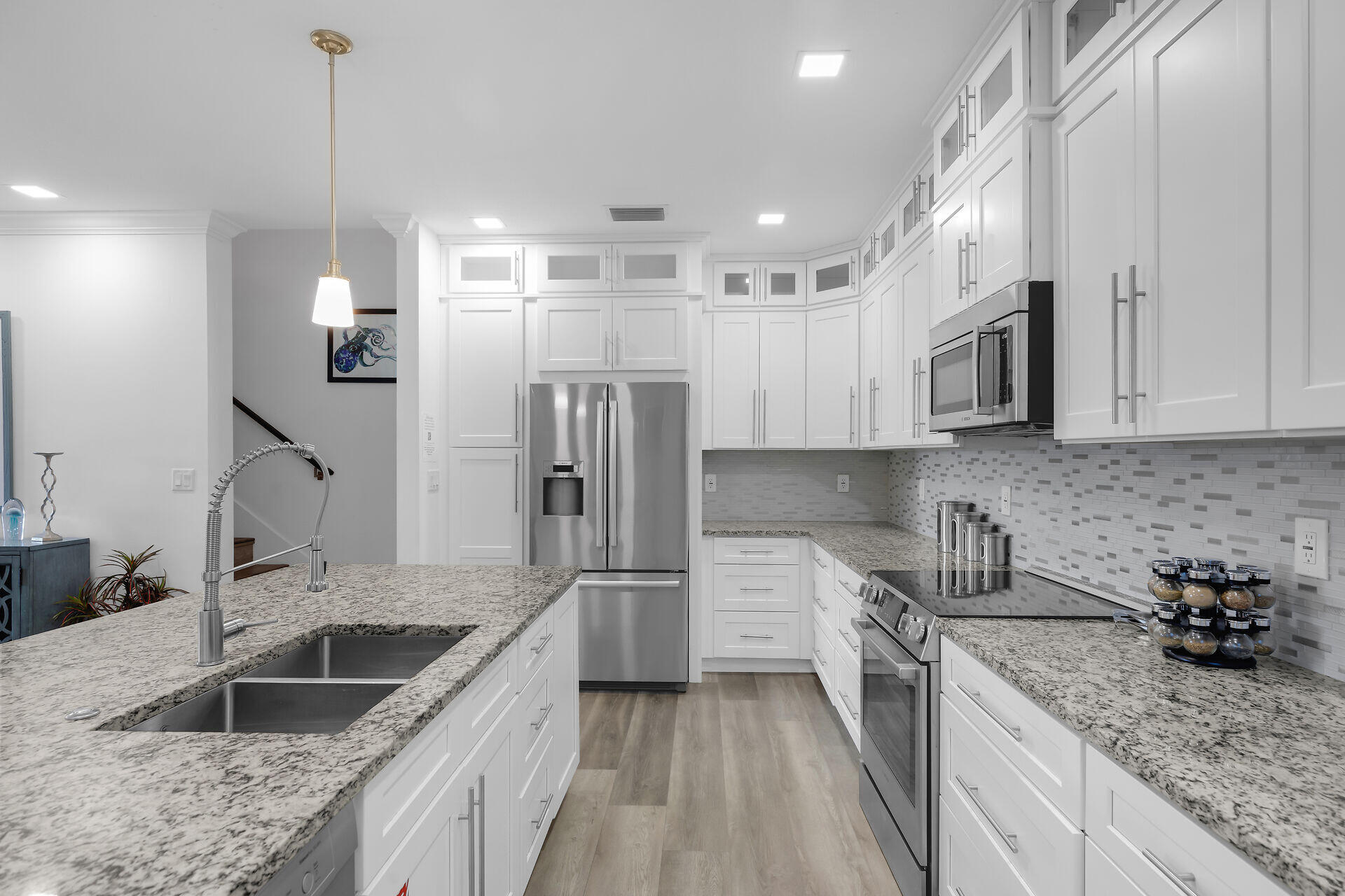 451 Sombrero Beach Road Marathon, FL 33050 - Photo 14 of 55 a kitchen with granite countertop a sink stainless steel appliances and cabinets