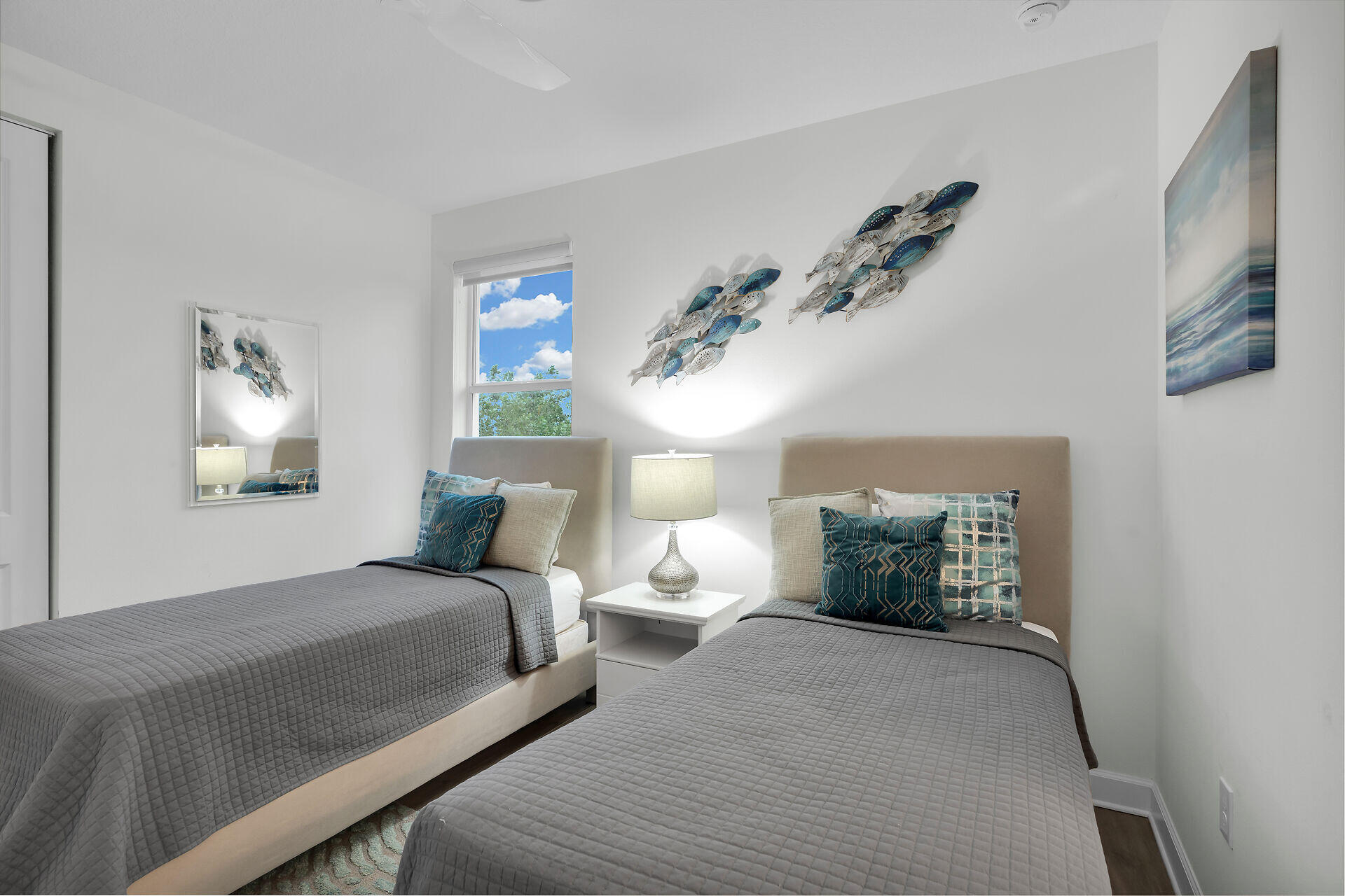 451 Sombrero Beach Road Marathon, FL 33050 - Photo 34 of 55 a bedroom with a bed and wooden floor