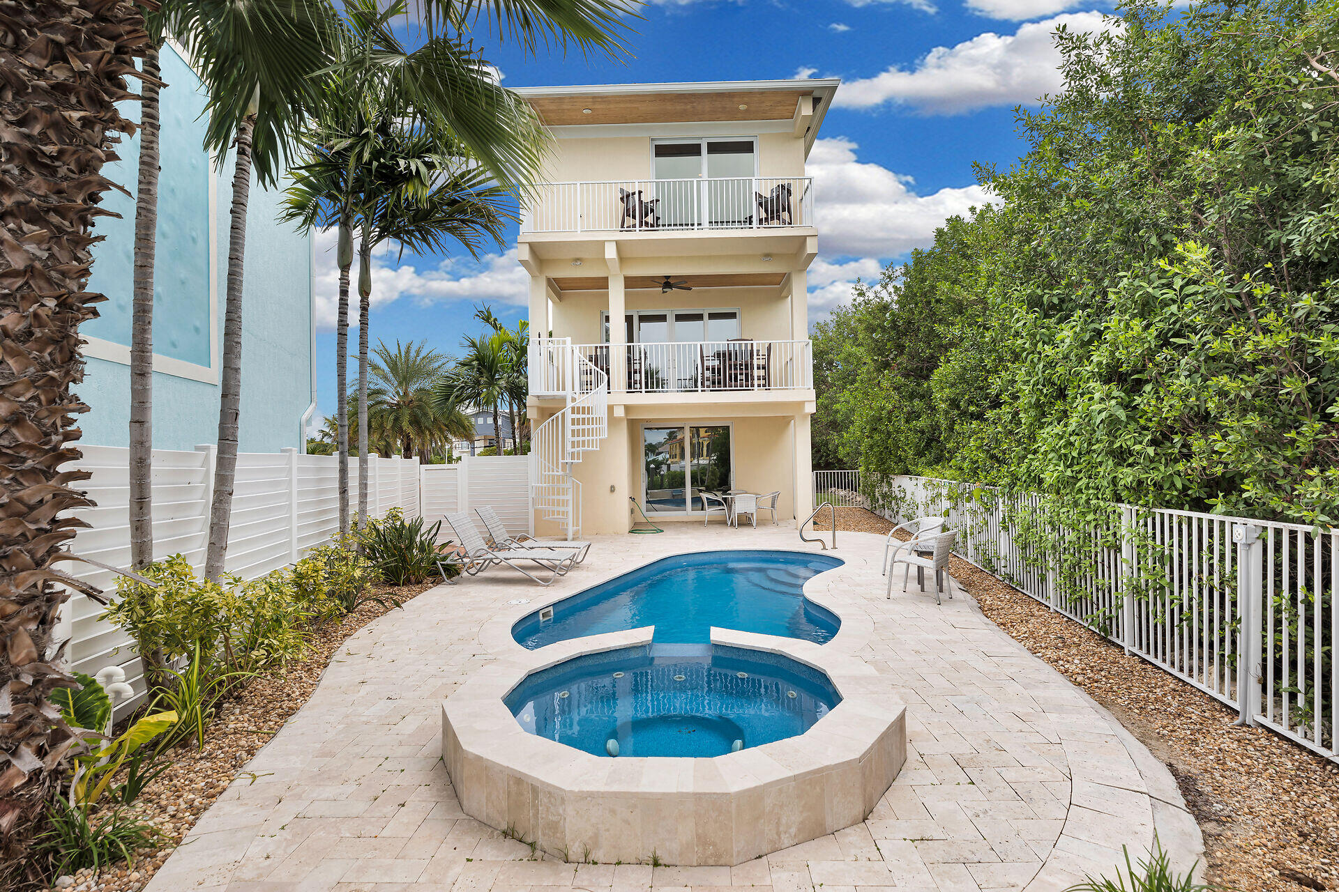 451 Sombrero Beach Road Marathon, FL 33050 - Photo 45 of 55 a view of a house with swimming pool and sitting area