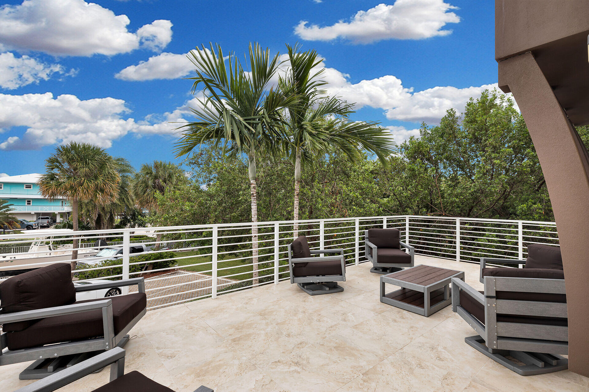 451 Sombrero Beach Road Marathon, FL 33050 - Photo 51 of 55 a view of a chairs and tables in the balcony