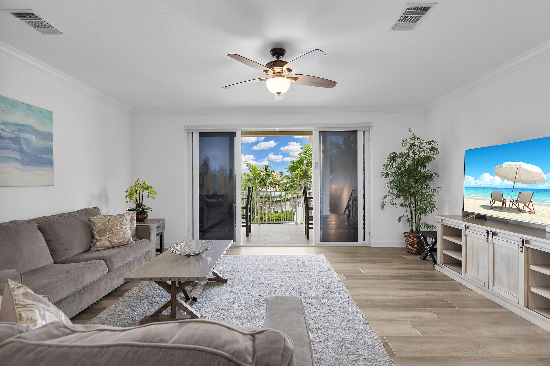451 Sombrero Beach Road Marathon, FL 33050 - Photo 6 of 55 a living room with furniture and a chandelier
