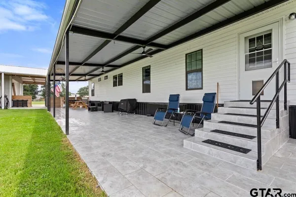 a view of outdoor space with seating area