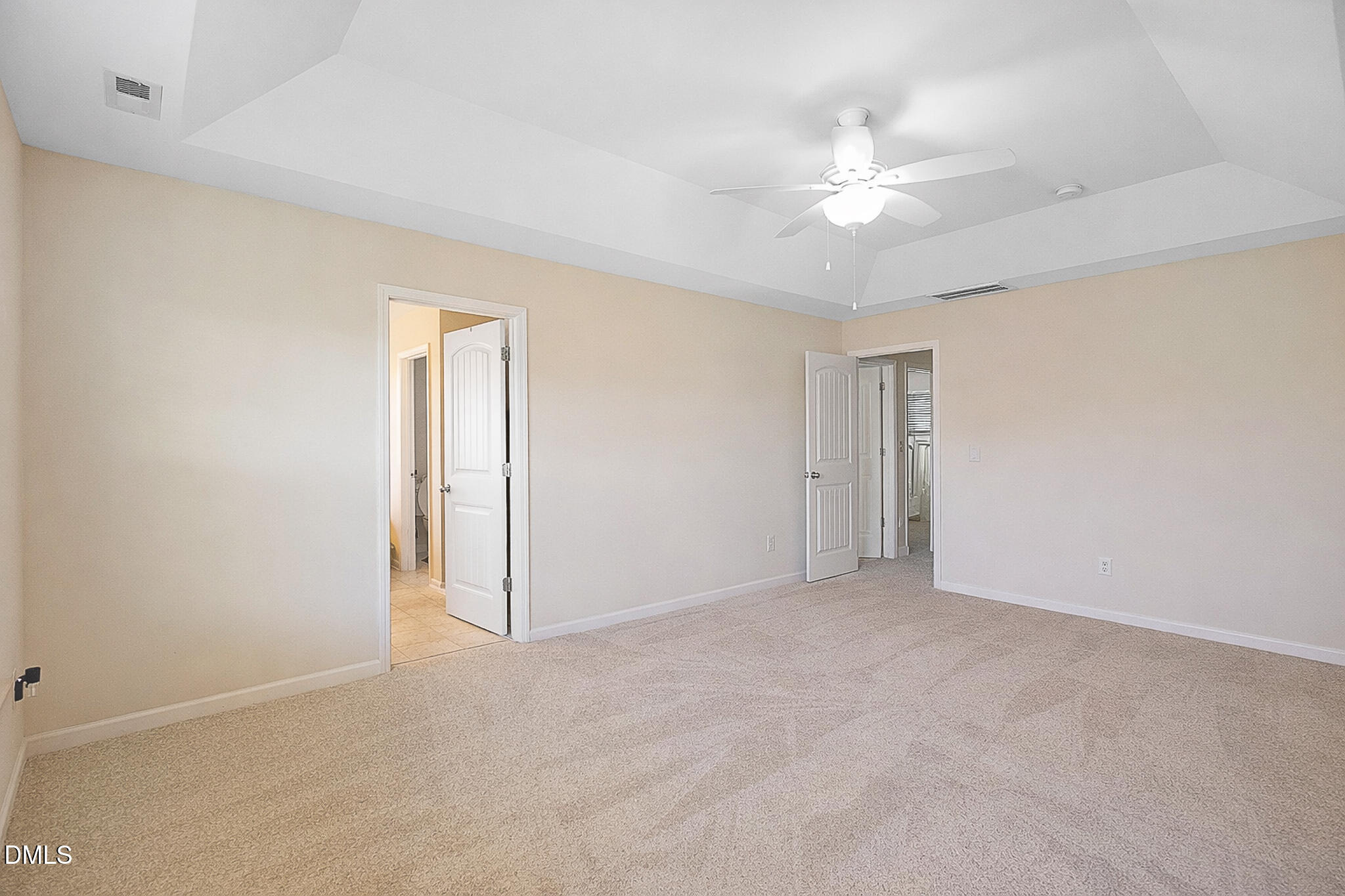 4249 Saubranch Hill Street Raleigh, NC 27616 - Photo 20 of 31 an empty room with a ceiling fan and a fan
