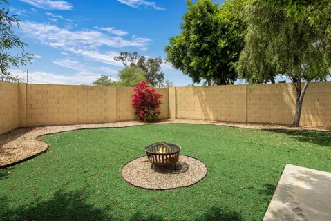 a backyard of a house with lots of green space