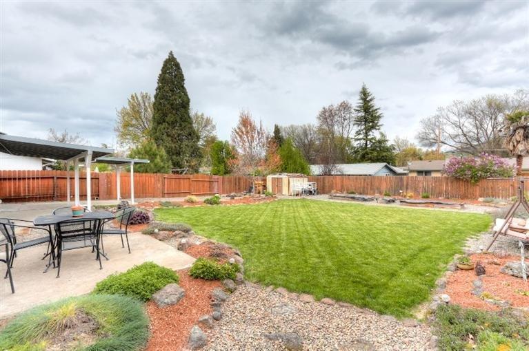 305 South Rose Street Phoenix, OR 97535 - Photo 22 of 35 Large backyard with garden shed.