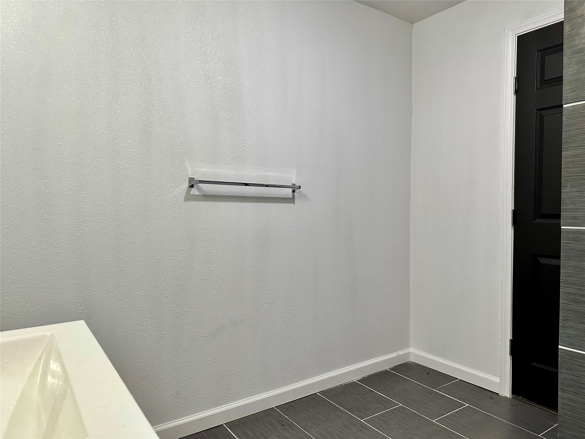 4802 Elser Street Houston, TX 77009 - Photo 16 of 21 a view of a room with racks on the wall