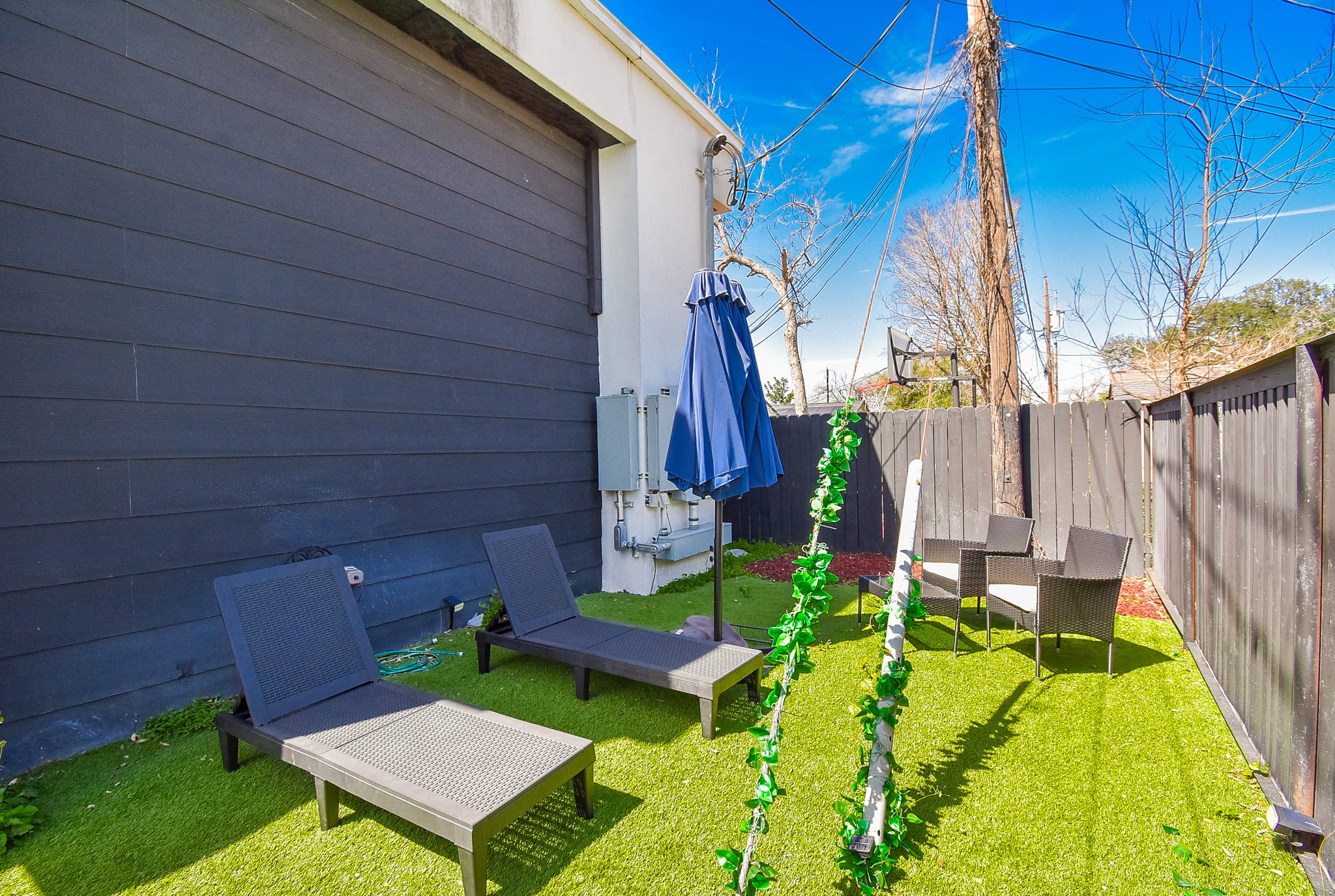 4802 Elser Street Houston, TX 77009 - Photo 18 of 21 a backyard of a house with outdoor seating