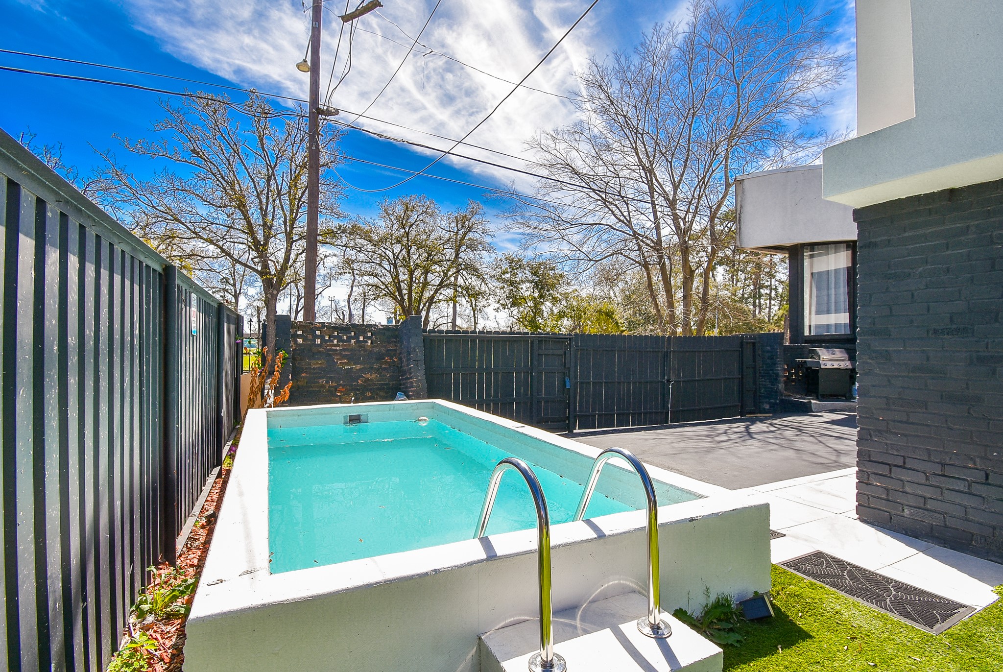 4802 Elser Street Houston, TX 77009 - Photo 19 of 21 a view of a backyard with a chair