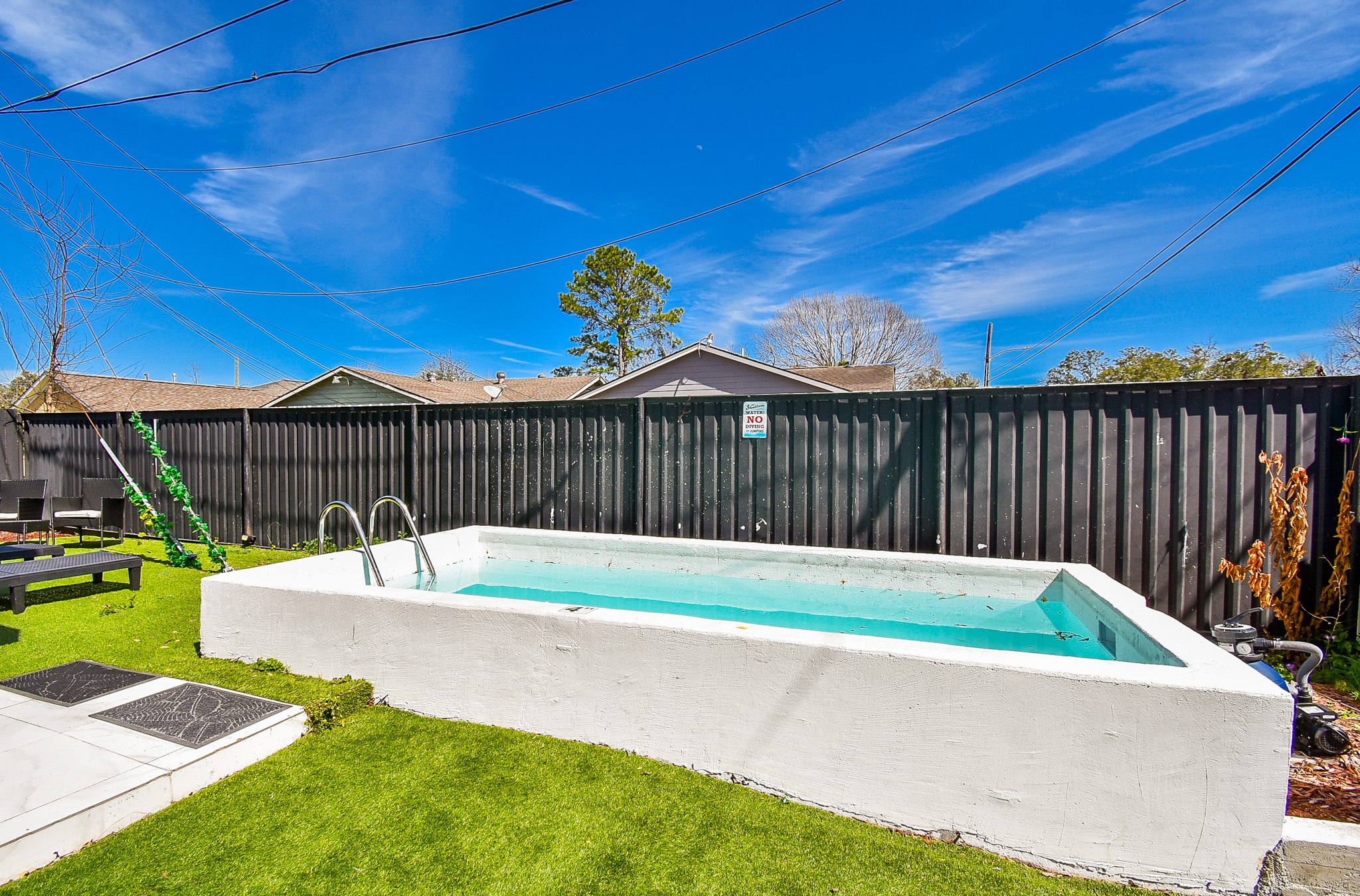 4802 Elser Street Houston, TX 77009 - Photo 20 of 21 a view of backyard with a small cabin