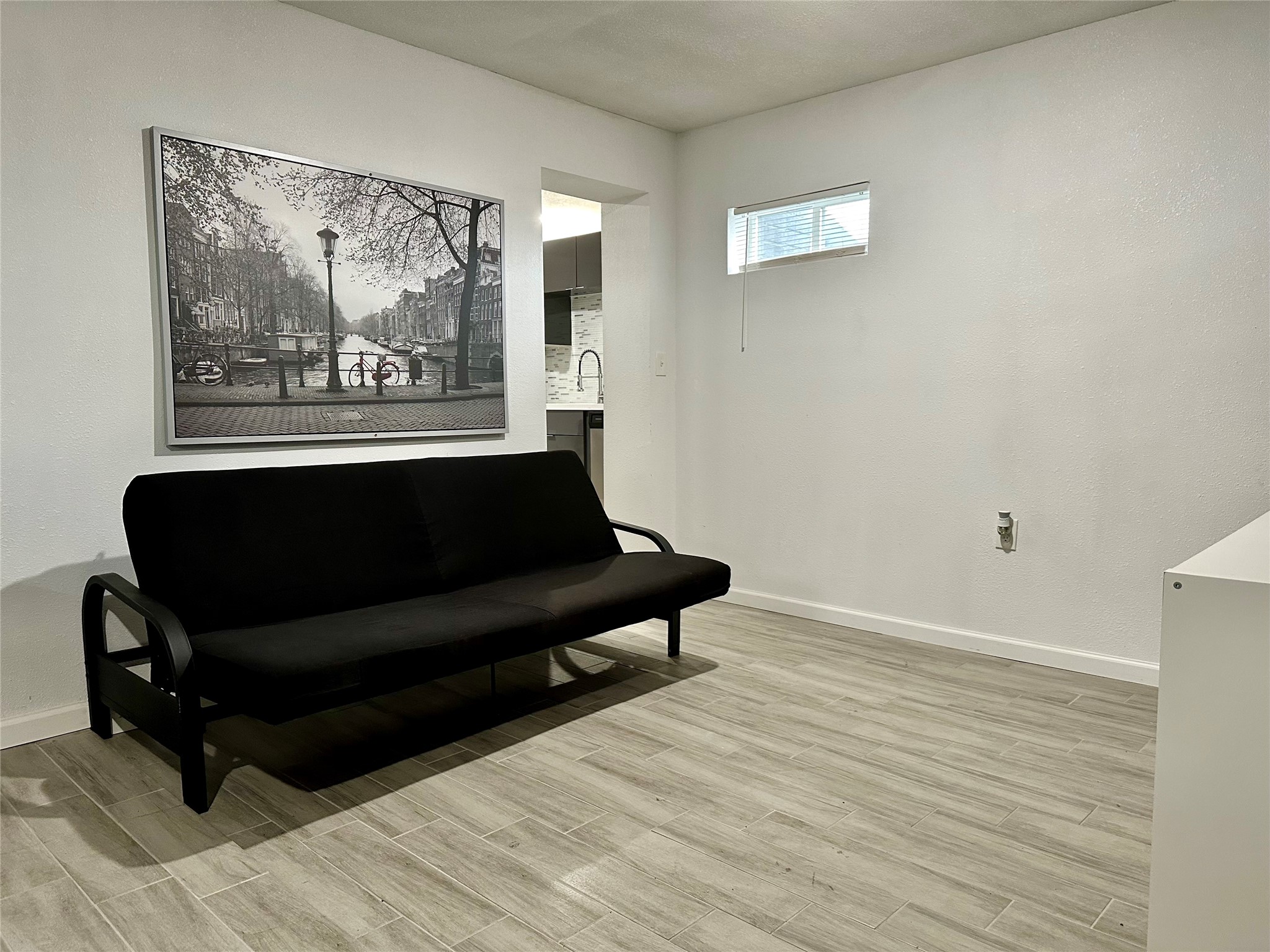 4802 Elser Street Houston, TX 77009 - Photo 7 of 21 a living room with a couch and a table