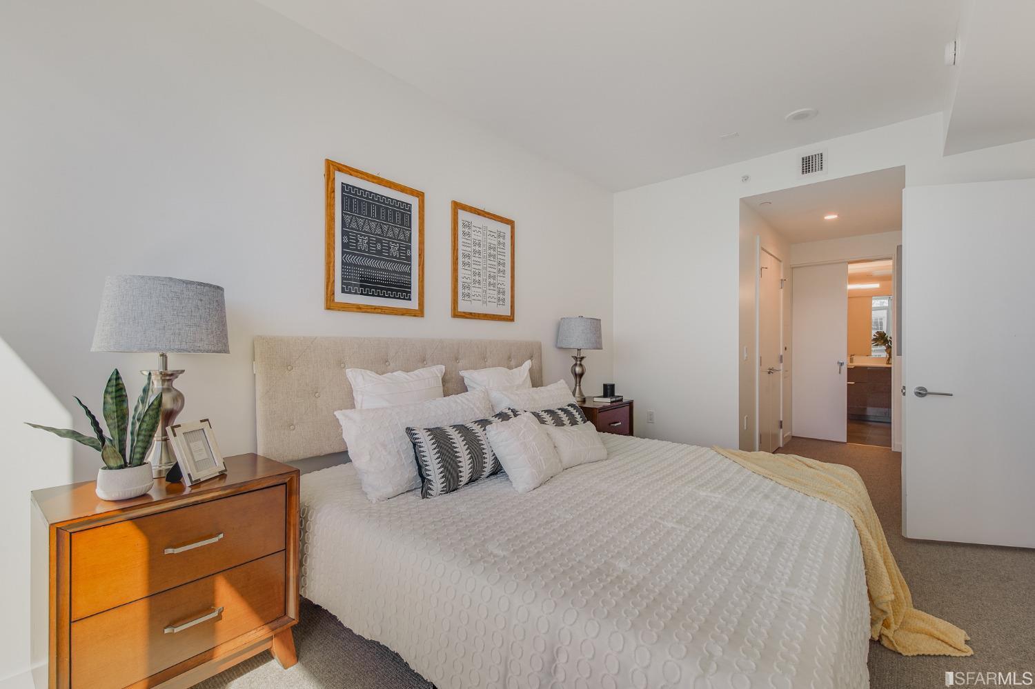 1000 3rd Street, Unit 605 San Francisco, CA 94158 - Photo 12 of 36 a bedroom with bed and window