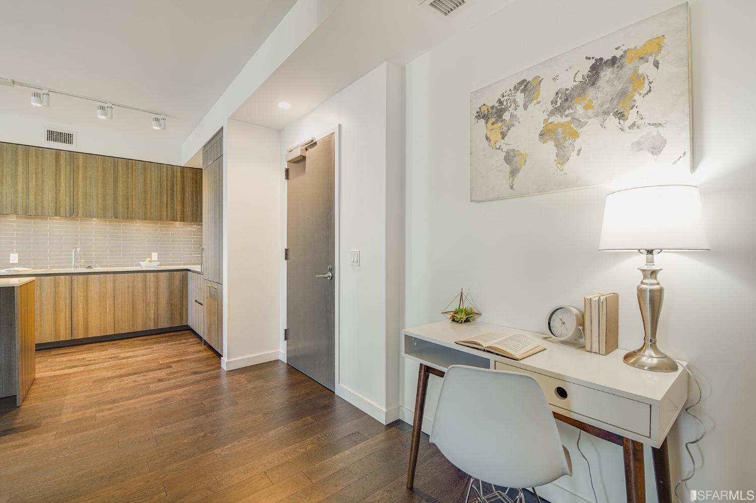 1000 3rd Street, Unit 605 San Francisco, CA 94158 - Photo 2 of 36 a workspace with furniture and wooden floor
