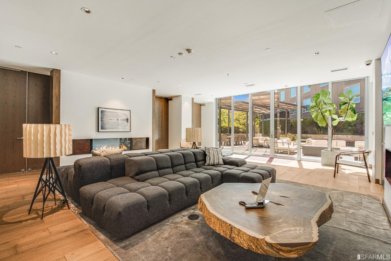 1000 3rd Street, Unit 605 San Francisco, CA 94158 - Photo 23 of 36 a living room with furniture and a large window