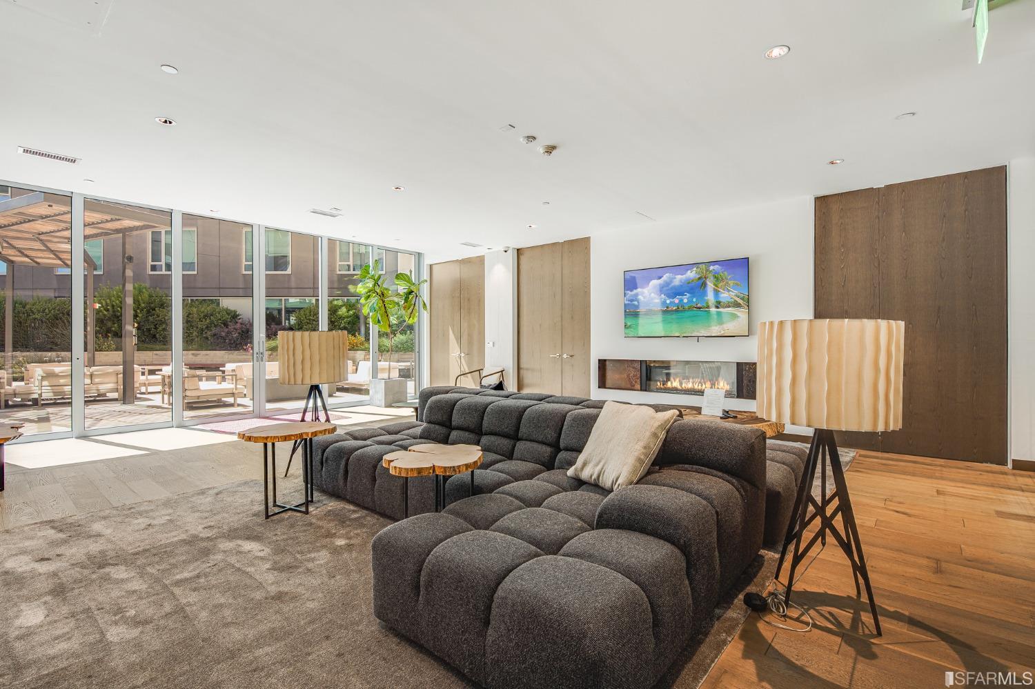 1000 3rd Street, Unit 605 San Francisco, CA 94158 - Photo 24 of 36 a living room with furniture and a large window