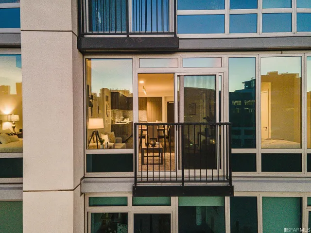 a view of a brick house with a large window