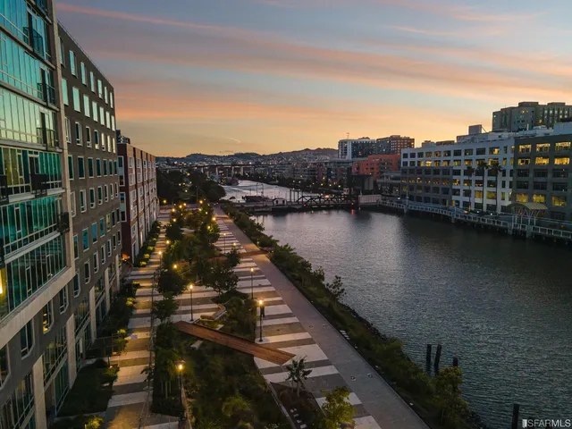 a view of residential houses with outdoor space