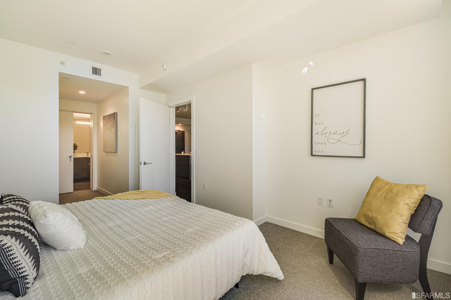 1000 3rd Street, Unit 605 San Francisco, CA 94158 - Photo 10 of 36 a bedroom with a bed and a couch